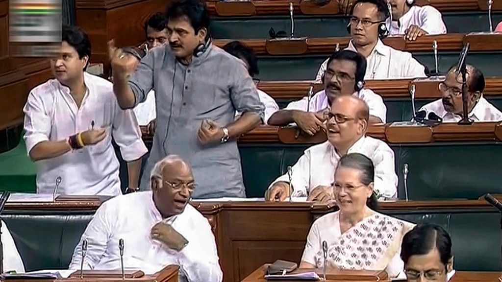 UPA Chairperson Sonia Gandhi, Mallikarjun Kharge and other Congress members in the Lok Sabha during the Monsoon session of Parliament on 19 July.&nbsp;