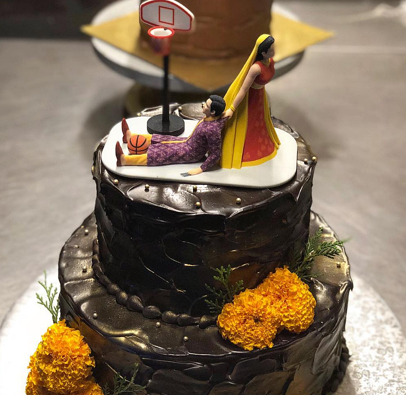 The 2-tier wedding cake had the couple’s wedding hashtag #EverydayPhenomenal piped onto it as a personalised touch!