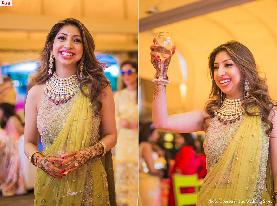 That time when you raise a toast, Tanya looks gorgeous in a lime green outfit for her <i>mehendi</i>.&nbsp;