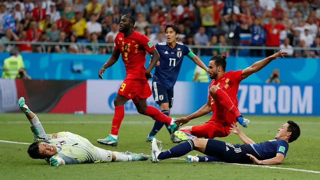 Belgium’s Nacer Chadli (second from right) scores his side’s third goal past Japan goalkeeper Eiji Kawashima during their Round of 16 at the Rostov Arena on Monday.