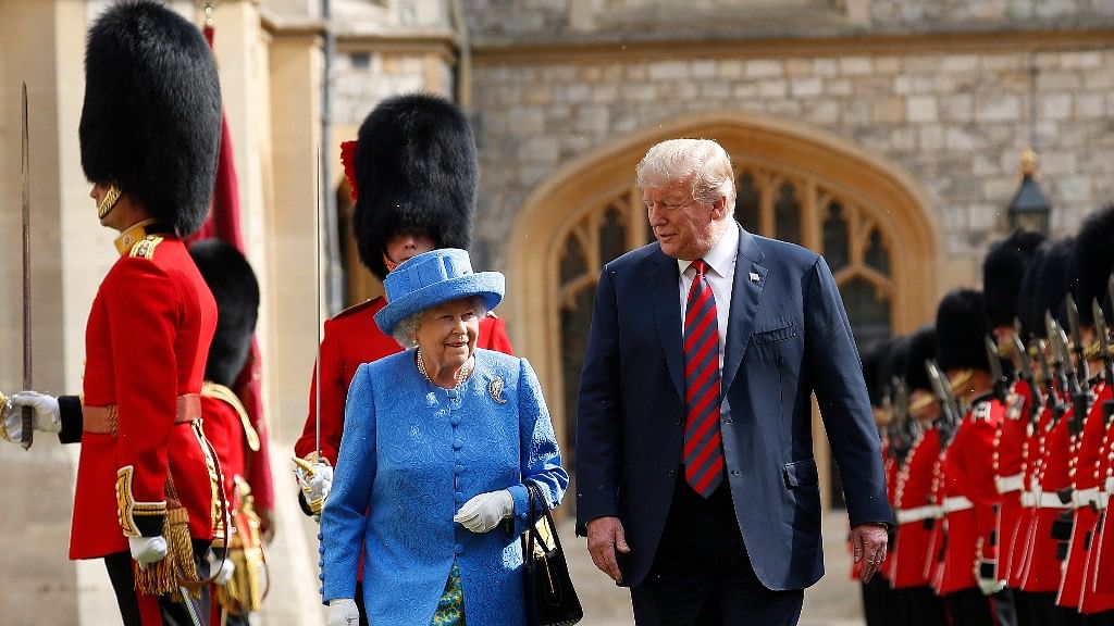 President Donald Trump with Queen Elizabeth II, inspecting the Guard of Honour at Windsor Castle in Windsor, England on 13 July.