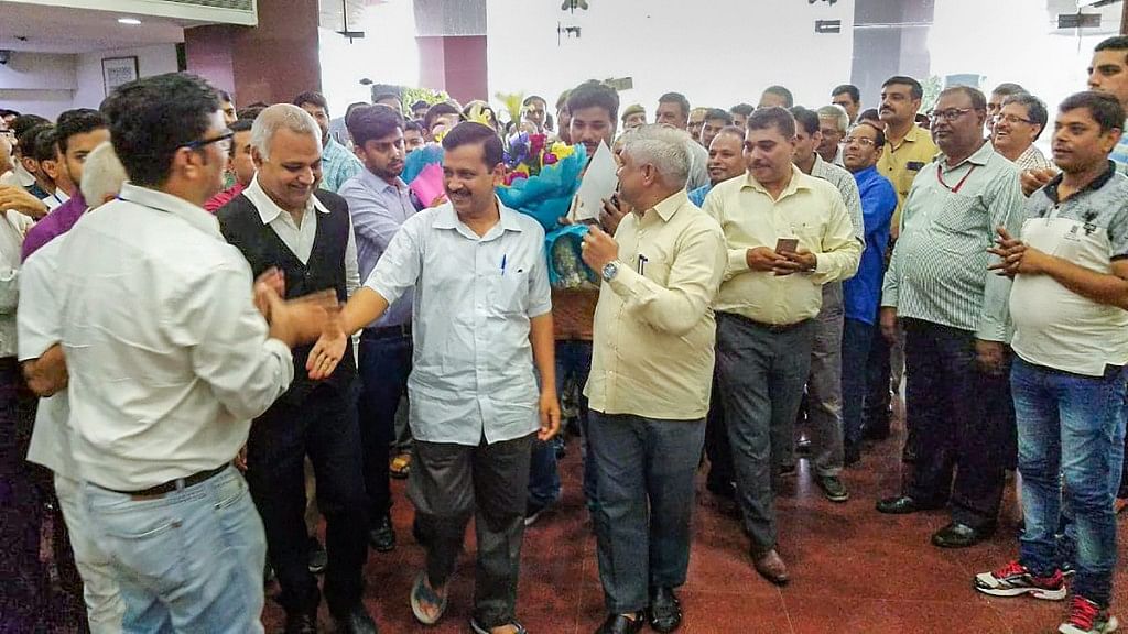 Delhi Chief Minister Arvind Kejriwal being welcomed by government and staff at Delhi Secretariat, in New Delhi on Wednesday, 4 July 2018.
