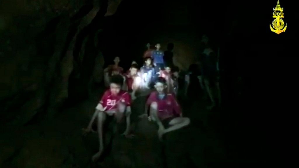 In this grab taken from video provided by the Thai Navy Seal, a view of the boys and their soccer coach as they are rescued in a cave, in Chiang Rai in Thailand.