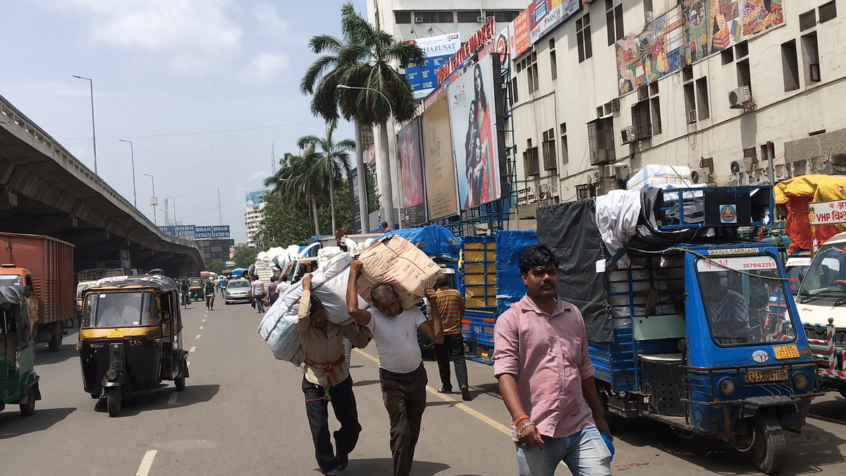 One Year of GST:  Surat’s textile hub is rocked by GST and businesses hit hard, say traders and labourers 