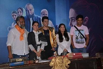 Mumbai: Filmmaker Anubhav Sinha with actors Rajat Kapoor and Taapsee Pannu at the trailer launch of "Mulk" in Mumbai on July 9, 2018. (Photo: IANS)