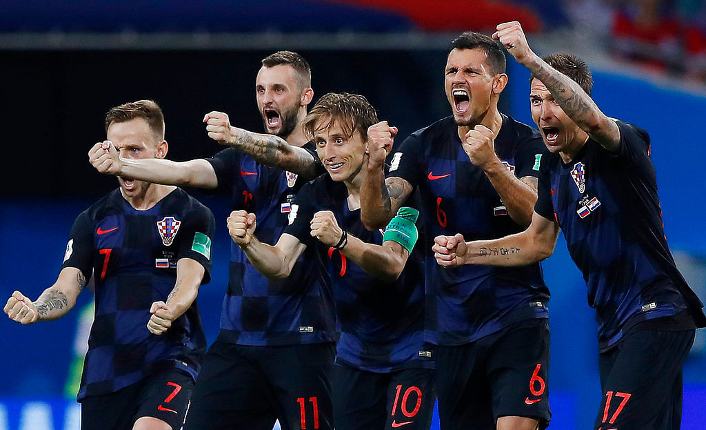 Croatia beat Russia 4-3 in penalties to set up a semi-final clash against England on Saturday.