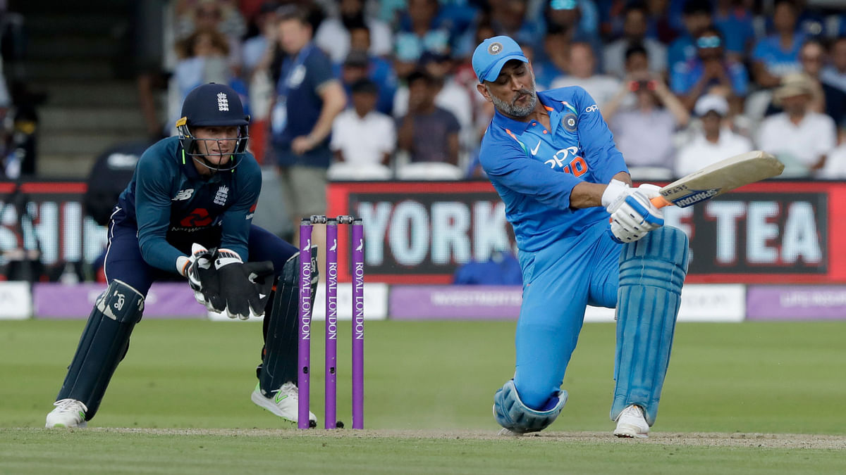 Kohli comes to the rescue of Dhoni whose painstaking 37 off 58 balls against England came in for sharp criticism.