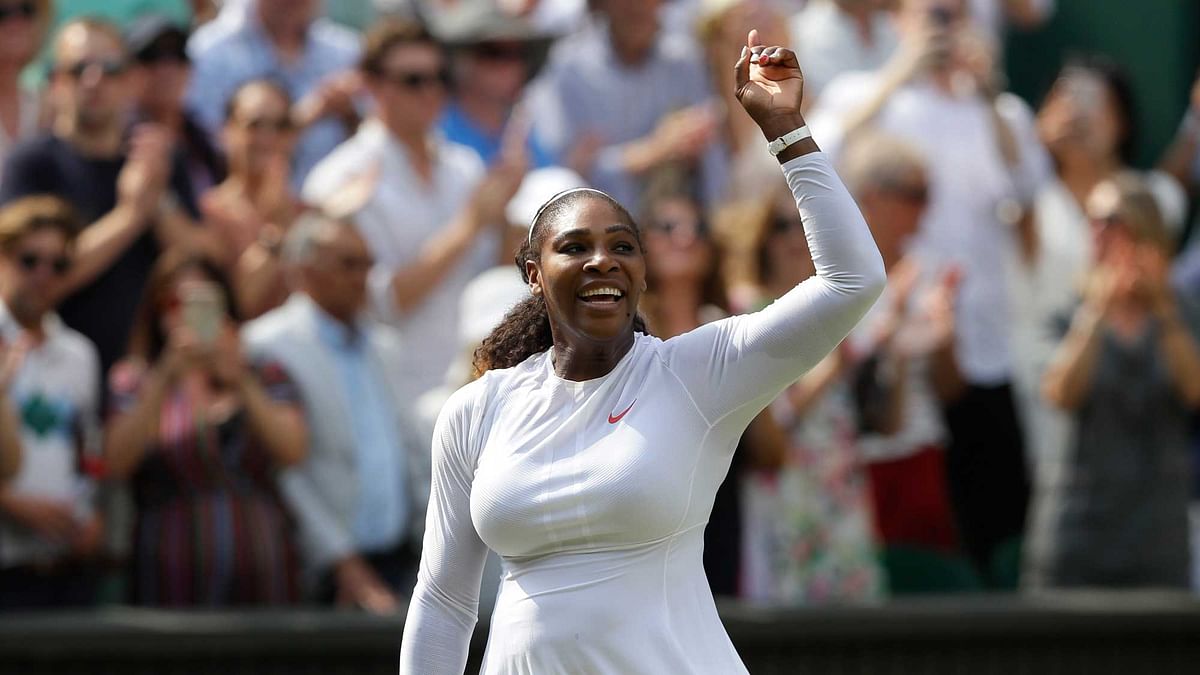 Serena Williams of the United States celebrates defeating Germany’s Julia Gorges in their women’s singles semifinals match at the Wimbledon Tennis Championships, in London, Thursday July 12, 2018.