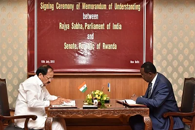 New Delhi: Vice President M. Venkaiah Naidu signs an MoU with Rwanda Senate President Bernard Makuza, in New Delhi on July 10, 2018.(Photo: IANS/PIB)