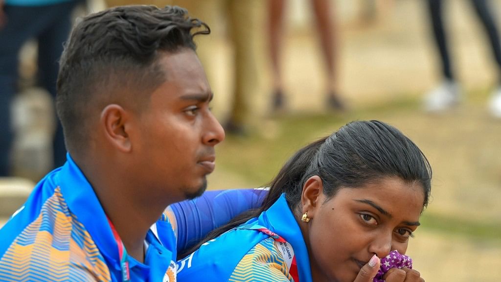  Indian archers Deepika Kumari and Atanu Das look dejected after recurve in mix team elimination event at the Asian Games.