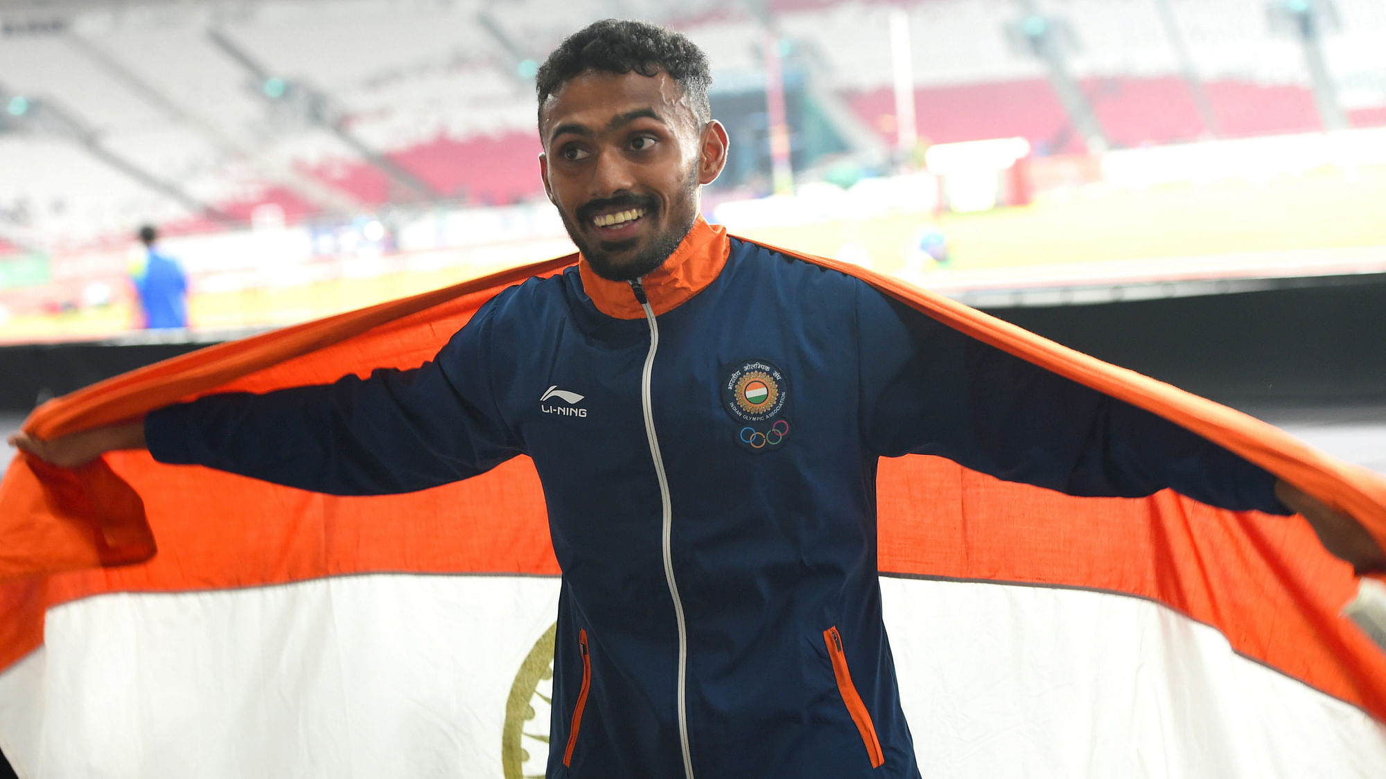 Indian athlete Yahiya Muhammed Anas holds the Indian tricolour after securing silver in men’s 400m final athletics event at the 18th Asian Games 2018 in Jakarta, Indonesia.
