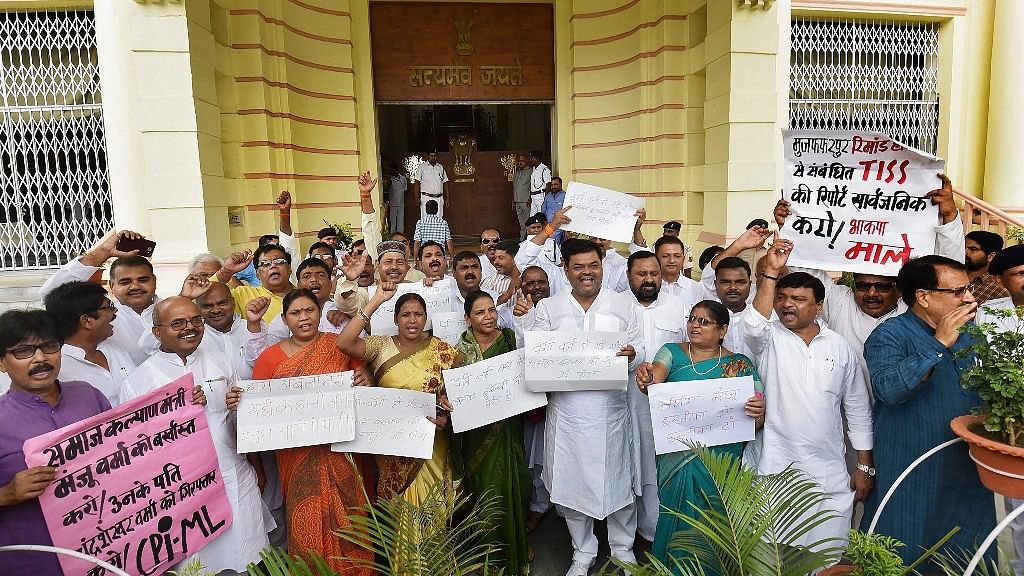  RJD, Congress and Communist Party of India legislators stage a protest against the Muzaffarpur shelter home rape case, during the ongoing Monsoon Session, outside Bihar Assembly in Patna on 26 July. Image used for representation.