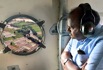 Kodagu: Karnataka Chief Minister HD Kumaraswamy conducts an aerial survey of the flood-hit Kodagu in Karnataka, on 19 August 2018. 