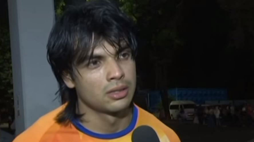 Neeraj Chopra speaks to the media after winning a gold medal in the javelin throw event at the Asian Games.