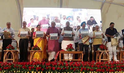 New Delhi: Union Home Minister Rajnath Singh launch Green Colourful New Delhi Municipal Council (NDMC) A Transformational journey book, in New Delhi, on Aug 13, 2018. Also seen Union Ministers Hardeep Singh Puri, Manoj Sinha, Lieutenant Governor Anil Baijal and BJP MP Meenakshi Lekhi. (Photo: IANS)