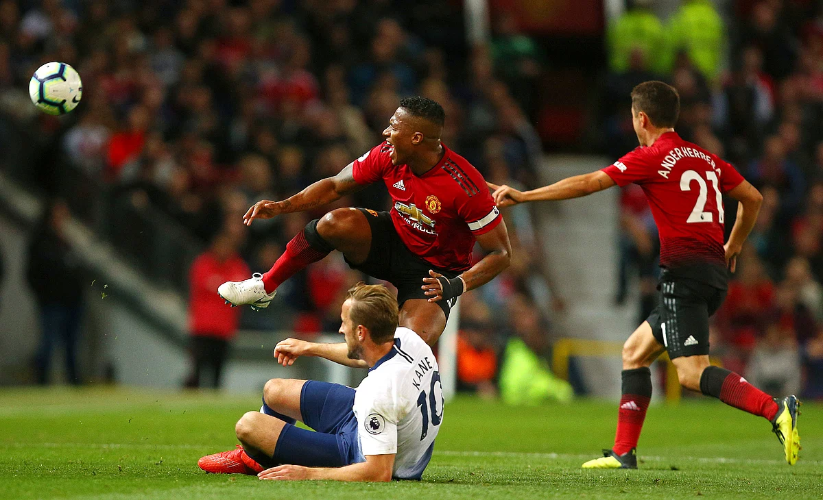 Manchester United’s Romelu Lukaku gets above Tottenham Hotspur’s Danny Rose during the English Premier League match between Manchester United and Tottenham Hotspur at Old Trafford stadium in Manchester, England.