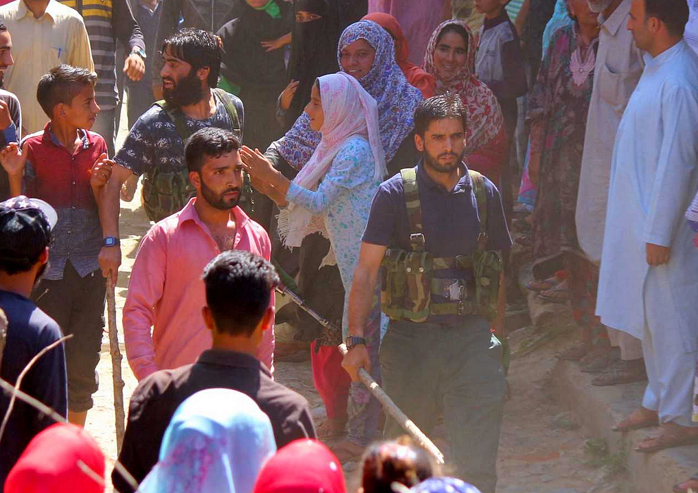 People gather at the funeral of Hizbul Mujahideen deputy field operations commander Altaf Dar alias Altaf Kachroo in Muniward.