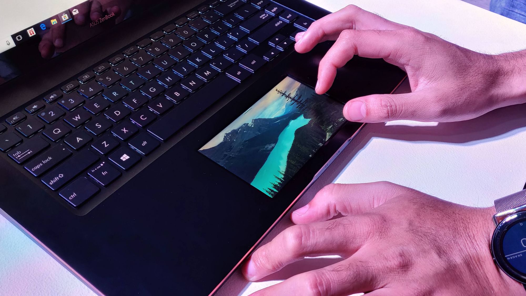 The Zenbook Pro has a display in the touch pad as well.&nbsp;