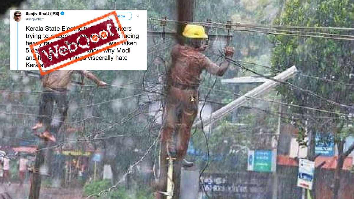 Fake!  Photo of Men Repairing Wires Is Not From Kerala Floods  