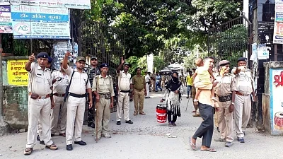 Sitamarhi: Policemen outside the court where jailed gangster Santosh Jha, sentenced to life imprisonment for killing two engineers, was shot dead in Bihar’s Sitamarhi district on Aug 28, 2018. Jha, lodged in Sitamarhi Jail, was a Maoist-turned-gangster. He was wanted in over 40 criminal cases and was arrested in Kolkata in 2014. (Photo: IANS)