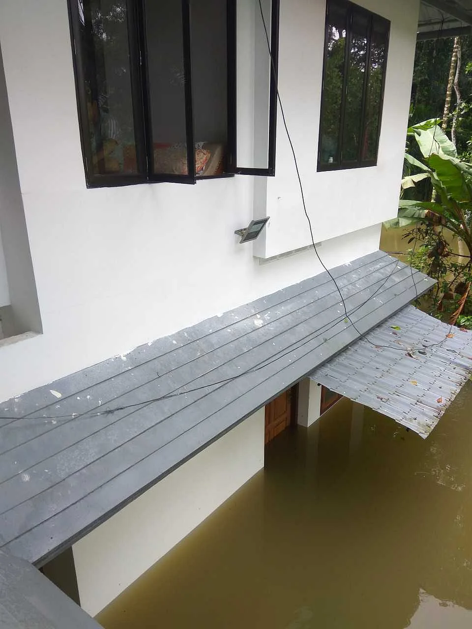 By the end of the day, water had entered the ground floor and we were stranded on the first floor.