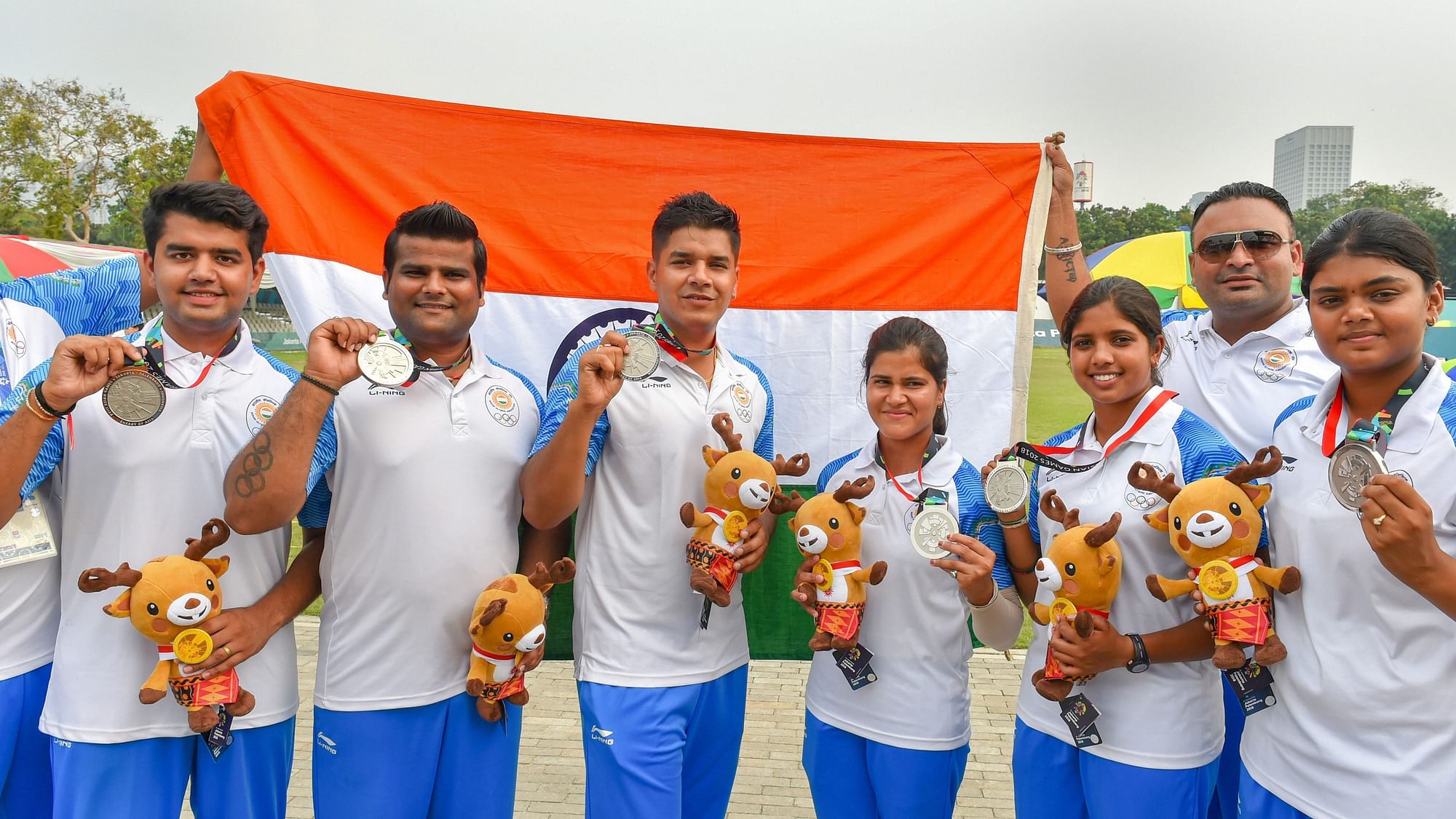 The Indian Men’s Compound Archery team  and the Indian Women’s Compound Archery team after the medal ceremony