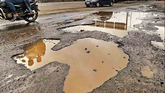 Representative photo of a pothole.