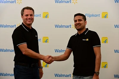 Walmart CEO Doug McMillon and Flipkart Co-Founder and CEO Binny Bansal. 
