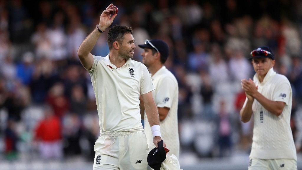 England’s James Anderson holds up the ball to applause as he leaves the pitch after taking 5/20 against India on the second day of the second Test at Lord’s on Friday.