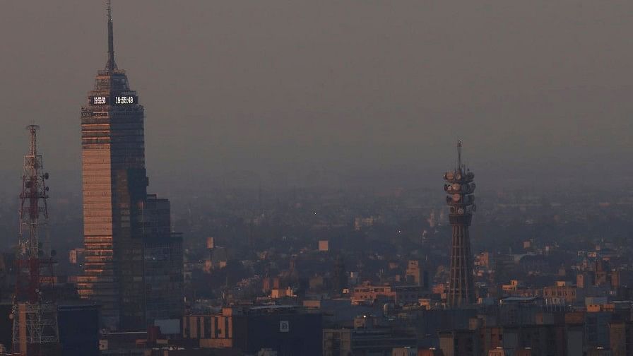 The Latinoamericana Tower stands amid smog in Mexico City.