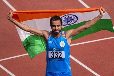 JAKARTA, Aug. 28, 2018 (Xinhua) -- Manjit Singh of India celebrates after men