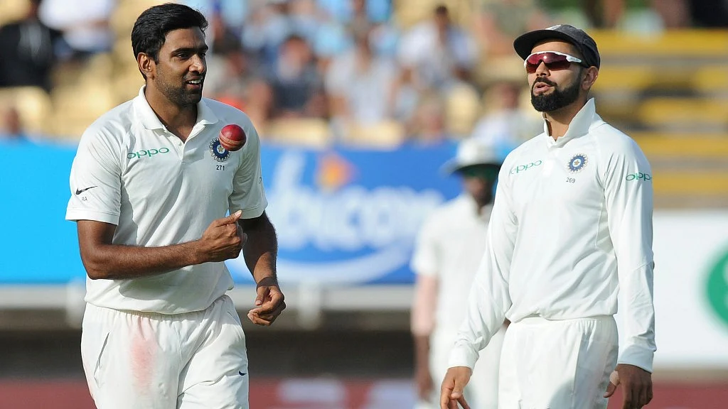 R Ashwin and Virat Kohli share a light moment.