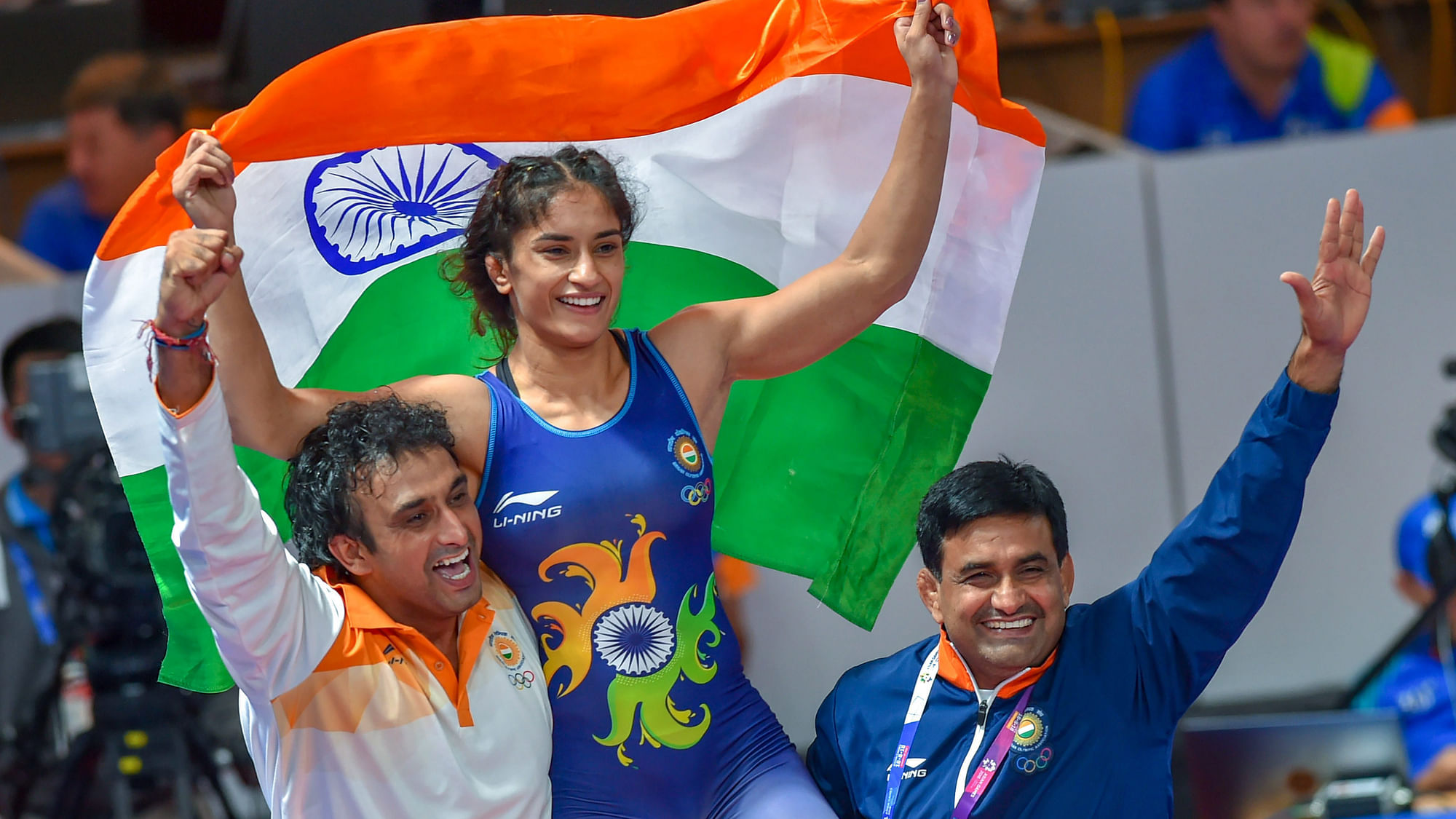 Jakarta: India’s Vinesh Phogat celebrates with the Tricolour after winning the Gold medal in women’s freestyle 50 kg wrestling at the Asian Games 2018, in Jakarta on Monday, August 20, 2018.&nbsp;