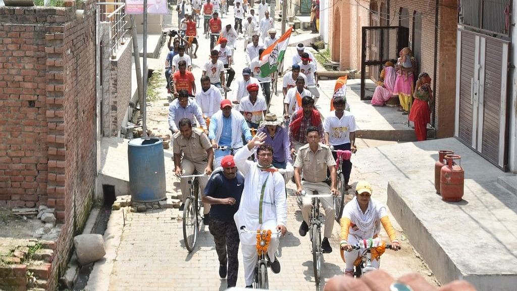  Haryana Pradesh Congress president Ashok Tanwar taking out a bicycle rally.&nbsp;