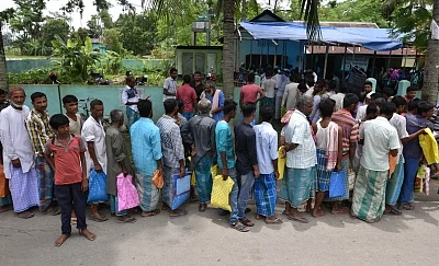 Guwahati: People queue up outside a NRC Seva Kendra in Nagaon to check their name on the first complete draft of the National Register of Citizens (NRC) that was published on July 30, 2018 and comprises names of 2,89,83,677 people of Assam. A total of 3,29,91,384 people had applied for inclusion of their names in the document, but 40,07,707 had been left out due to some discrepancies in their documents.All genuine Indian citizens whose names did not figure in the NRC will get ample opportunities