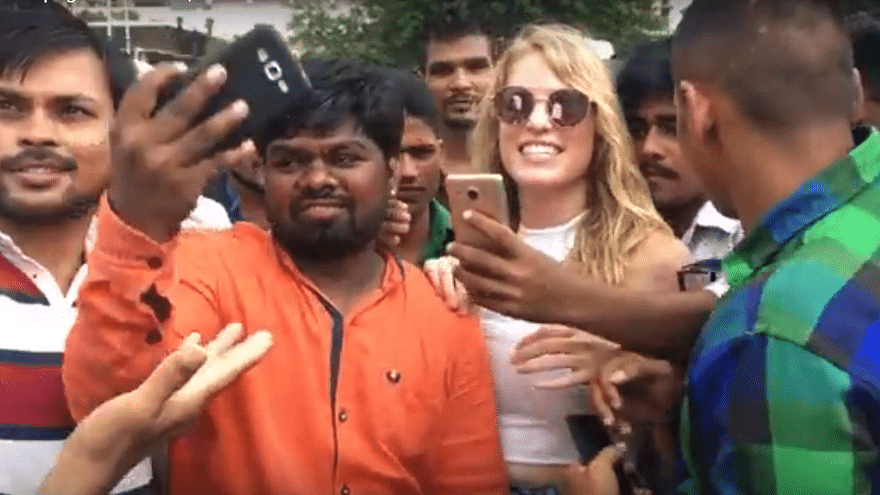In the video, the woman is seen being constantly hassled for selfies by men in Mumbai.