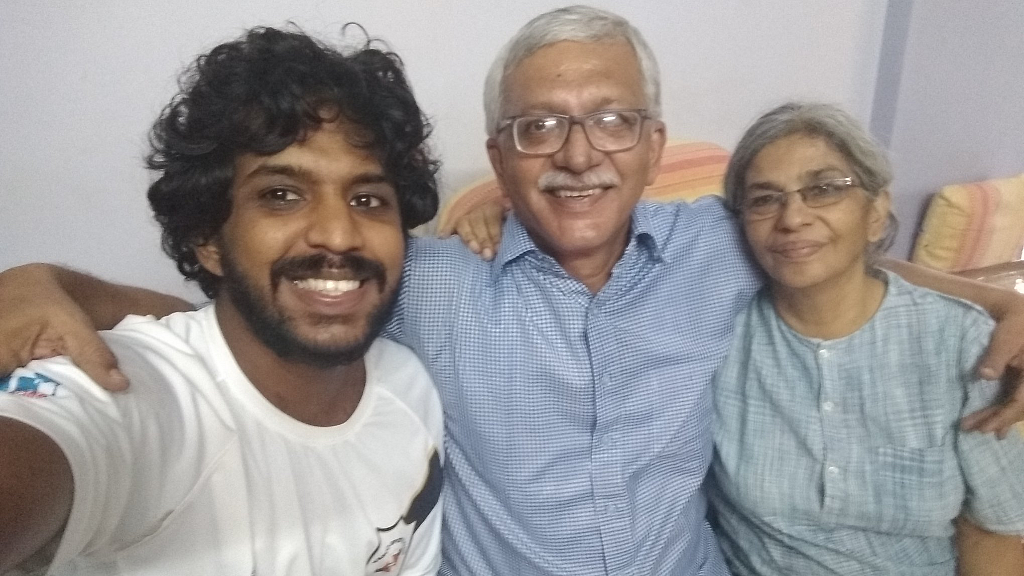 On the day of the arrest: Activist Vernon Gonsalves, lawyer Susan Abraham and their son Sagar click a selfie before the cops take Vernon away.