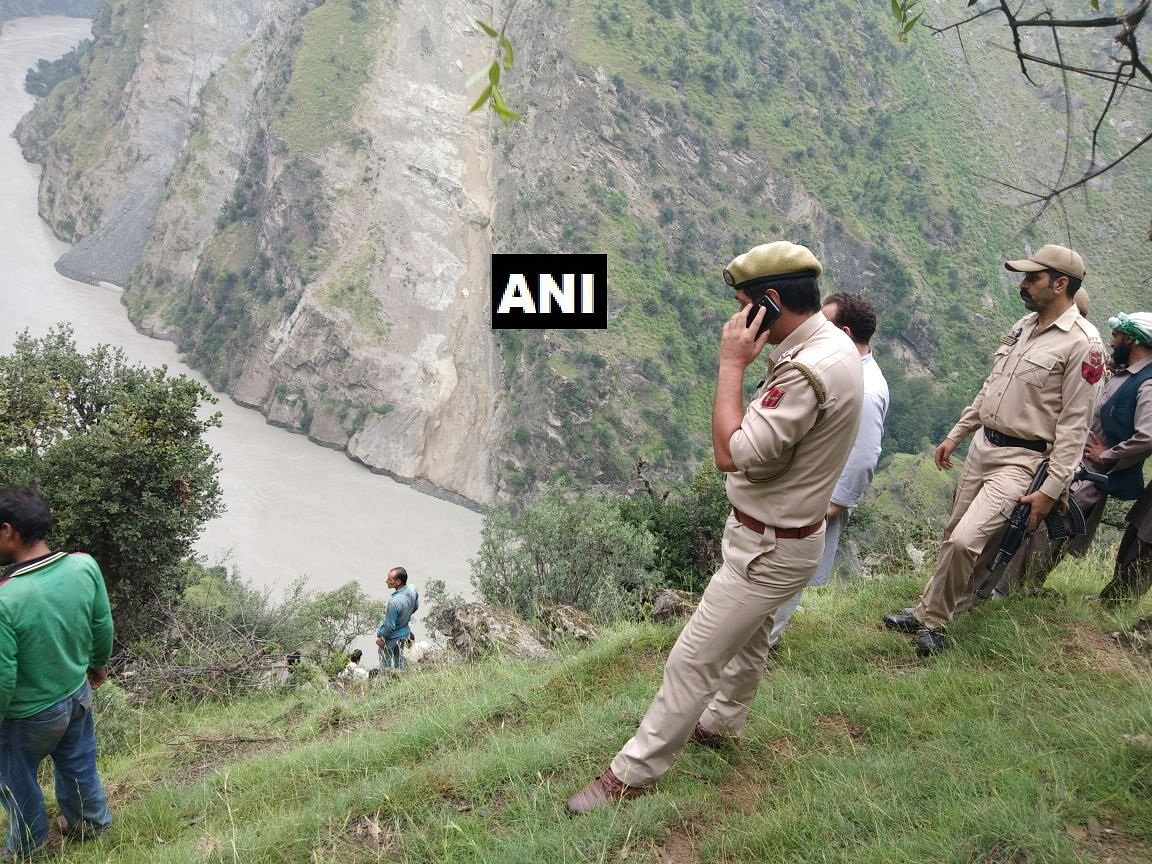 A vehicle carrying yatris to Machail Mata, rolled down into the Chenab river, killing 13 people on the spot. 
