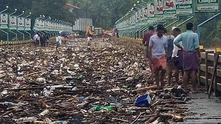 The Malayattoor-Kodanad bridge in the Ernakulam district was filled by garbage and filth after the water receded.