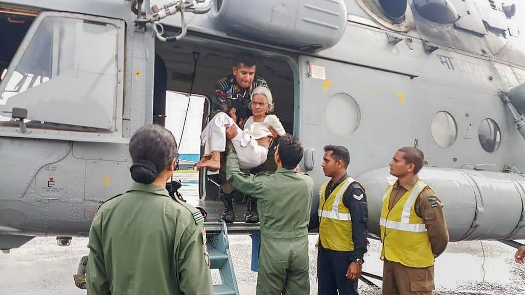  Indian Air Force members conduct rescue and evacuation drive in flood-affected regions of Kerala.