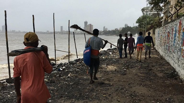 Volunteers for a beach clean-up drive have combined forces with BMC workers to clean up the waste-filled Dadar beach.