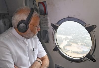 Kerala: Prime Minister Narendra Modi conducts an aerial survey of flood affected areas, in Kerala on Aug 18, 2018. (Photo: IANS/PIB)