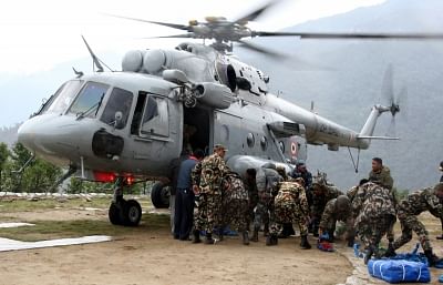 Nepal: Relief materials being unloaded from a Indian Air Force