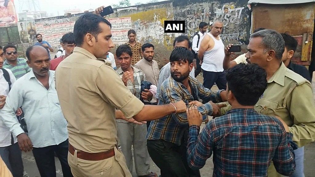 Two Muslim youths were allegedly thrashed and paraded by a mob led by the head of a vigilante group on suspicion of smuggling two cows in UP.&nbsp;