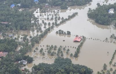Kerala: An aerial view of the flood-hit areas of Kerala on Aug 18, 2018. Overflowing rivers and a series of landslides have caused the death of 180 people as of Saturday morning, with over three lakh people forced to move to some 2,000 relief camps. The disaster has triggered an unprecedented rescue and relief operation led by the Army, the Air Force and the Navy along with teams of National Disaster Response Force involving about 1,300 personnel and 435 boats. Prime Minister Narendra Modi on Sa