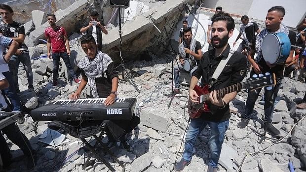 Artists Perform Amidst Ruins of Bombed Cultural Centre in Gaza
