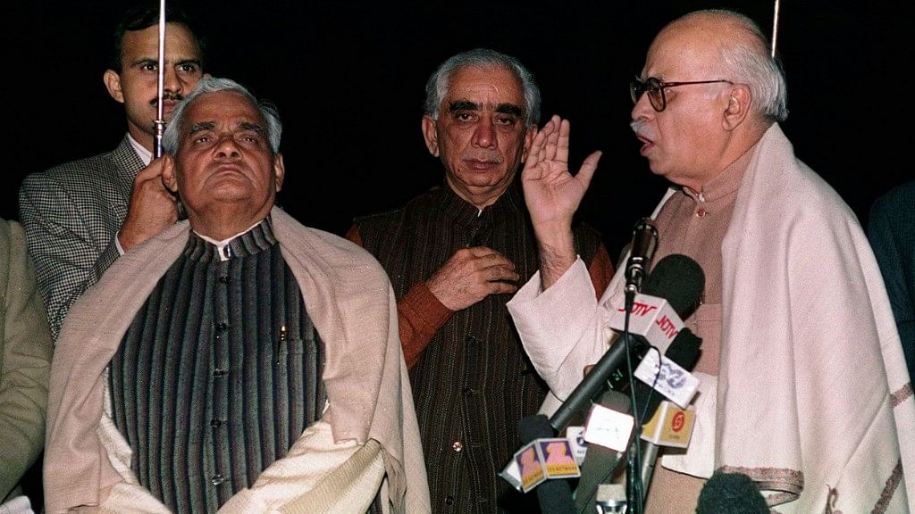In this 30 Nov, 1997 file photo, Bharatiya Janata Party leaders LK Advani (R), Jaswant Singh (C) and Atal Bihari Vajpayee (L) address reporters after meeting with Indian President KR Narayanan.&nbsp;