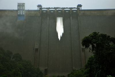 Idukki: One of the shutter of Idukki reservoir opened to maintain the water level in Idukki, Kerala on Aug 9, 2018. One of the highest dams in Asia, it is a double curvature, thin arc dam across the Periyar River in Kerala. (Photo: IANS)