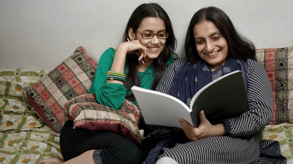 Indian Women Burdened by Housework, Pay the Motherhood Penalty