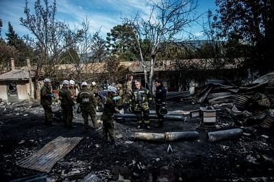 SANTIAGO, Aug. 14, 2018 (Xinhua) -- Policemen work at Santa Maria Nursing Home after a fire swept through the facility in Chiguayante, Biobio region, Chile, Aug. 14, 2018. A fire at a private nursing home in Chiguayante on Tuesday claimed the lives of 10 elderly women, local officials said. (Xinhua/Chilean Presidential Office/IANS)